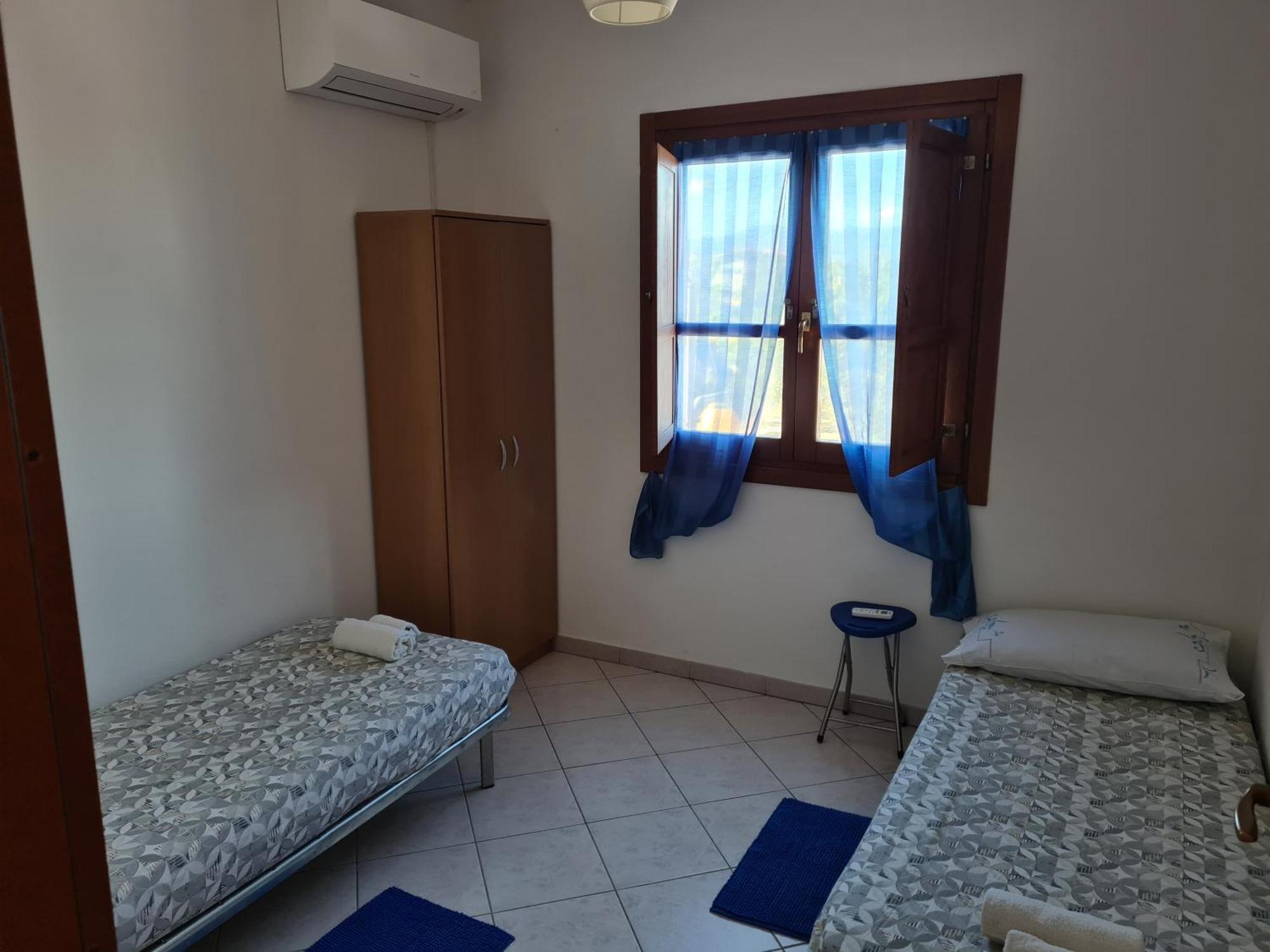 Casa Vacanze Spiga ตอร์โตลี ภายนอก รูปภาพ